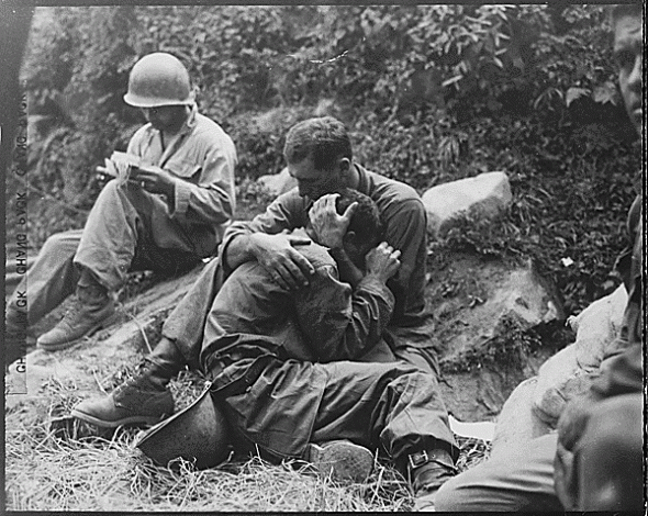 Soldiers consoling each other Al Chang for the US Army 1950