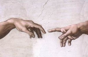 Michaelangelo hands of God and Adam