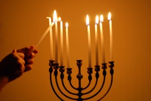 Lighting the Hanukkah menorah