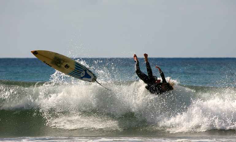 Surfer wiping out