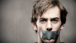 Man with mouth taped shut