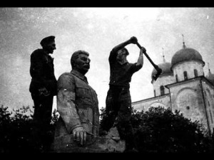 Destroying Stalin's statue