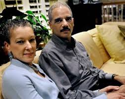 Eric Holder and his wife