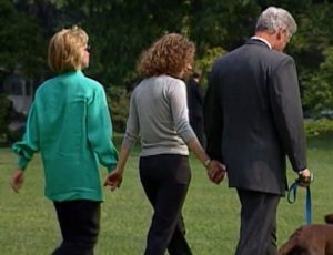 Bill, Hillary, and Chelsea in 1998, immediately after the blue dress forced Bill to confess.