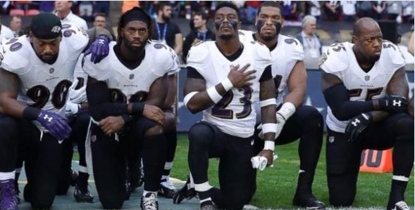 NFL players take a knee