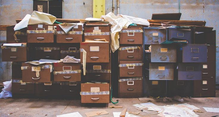 Cleaning closet file cabinets papers